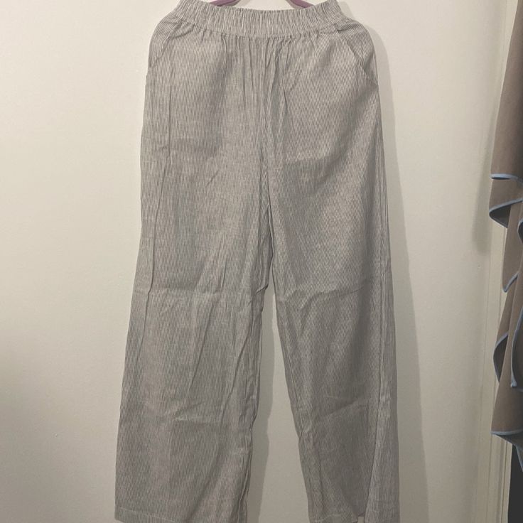 Super Cute Lightweight Unlined Pants, Nwt. Stretchy Waistband, Wide Legged, Loose Fit With Pockets. I Normally Wear A Small/25 Pants And Waist Fits Tts, However Am Only 5’0 And Way To Long For Me. High Waist Stretch Linen Bottoms, High Waisted Stretch Linen Bottoms, Non-stretch Wide-leg Pants With Pull-on Style, Straight Leg Pull-on Bottoms For Day Out, Pull-on Pants For Day Out, Gray Ankle-length Pants With Elastic Waistband, Casual Pull-on Pants For Day Out, Pull-on Style Pants For Day Out, High Waist Stretch Linen Pants