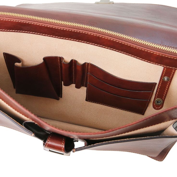 Experience the elegance of a true Italian leather briefcase. Handcrafted with precision by skilled artisans in Tuscany, this briefcase embodies the essence of Italian craftsmanship. Made from 100% full-grain leather, it merges luxury and functionality seamlessly. Ideal for professionals, its semi-rigid structure and three compartments ensure ample space for documents, a laptop, and other essentials. Featuring antique brass or nickel hardware, this italian leather briefcase is built to last. The 2nd December, Leather Briefcase Bag, Leather Messenger Bag Men, Laptop Briefcase, Nickel Hardware, Leather Laptop, Leather Messenger Bag, Leather Briefcase, Leather Messenger