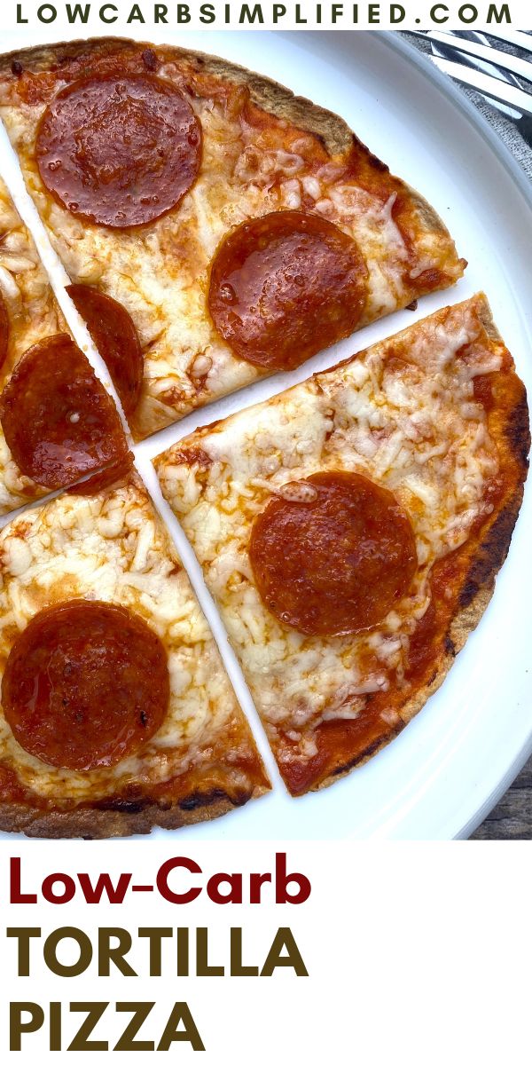 a pizza cut into eight slices on a white plate with the words low carb tortilla pizza