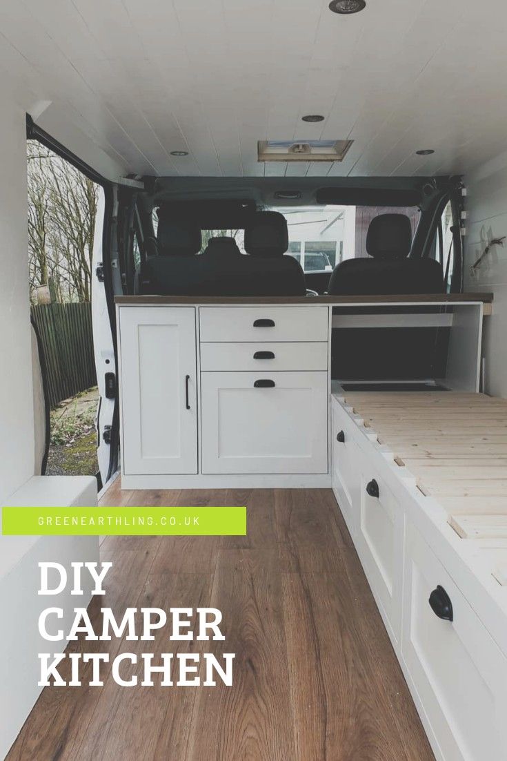 the interior of a camper with white cabinets and wood flooring is featured in this ad