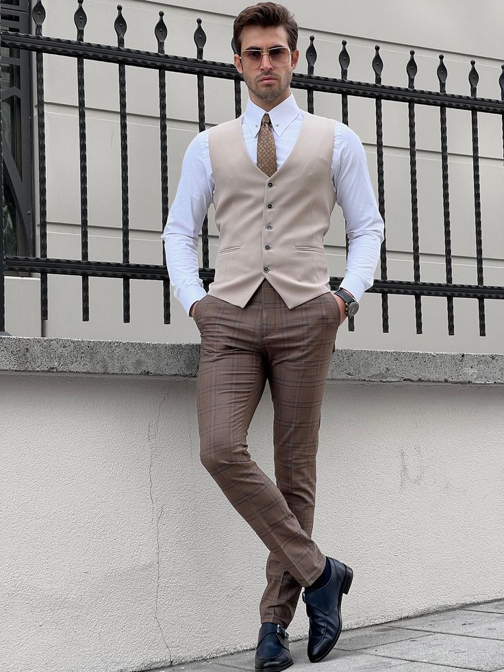 NEW COLLECTİON - FW / 23Collection: Fall / Winter - 23Production: Private Collection Slim-fit Wool Beige Men’s WaistcoatProduct color: BEİGEProduct material: %40 Wool , %30 Viscon , %25 Polyester , %5 ElestanProduct details: The waistcoat is adjustable from the back.Product care: Dry clean onlyProduct size: 48-50-52-54-56-58Package İncluded : Waistcoat Dimensions of the mannequin: 185cm / 78kg , Size : 50EU / 40US Cream Vest Outfit Men, Cream Vest Outfit, Vest Dress Outfit, Brown Vest Men, Vest Outfits Men, Classy Outfits Men, Elevated Style, Elegant Man, Brown Pants