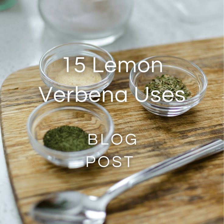 three small bowls with different types of herbs in them on a cutting board next to a spoon