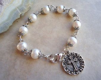 Cross Charm Bracelet.Pearls.Metal plate in 24 Karat | Etsy Spiritual Pearl Beaded Bracelets, Handmade Rosary Bracelet With Round Beads For Wedding, Spiritual Beaded Pearl Rosary Bracelet, Adjustable 8mm Pearl Bracelet For Wedding, Spiritual Pearl Beaded Rosary Bracelet, Elegant Handmade Jewelry For First Communion, Pearl Rosary Bracelet For Weddings, Spiritual Pearl Rosary Bracelet For Wedding, 8mm Pearl Bead Bracelets For Weddings