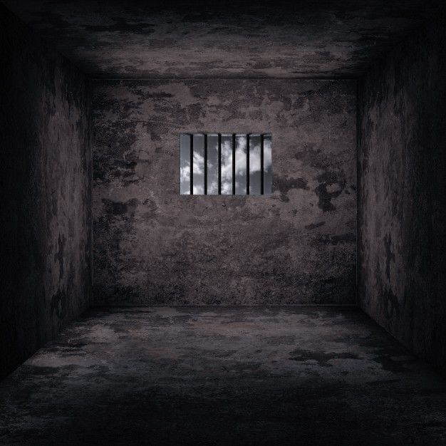 an empty room with bars on the wall and one window in the middle that is open