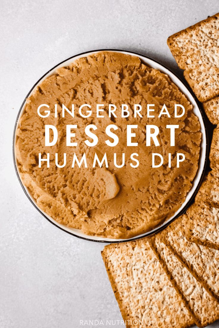 gingerbread dessert hummus dip on a plate with crackers next to it and the title overlay reads, gingerbread desert hummus dip