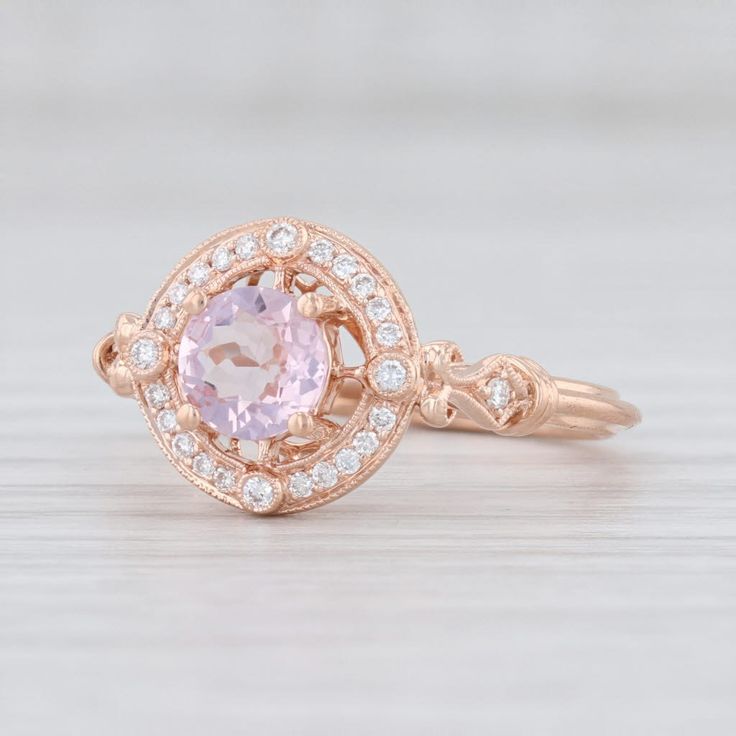 This is a new Beverley K engagement style ring. Gem: Natural Diamonds - 0.12 Total Carats, Round Brilliant Cut, F - G Color, VS2 - SI2 Clarity - Morganite - 0.50 Carats, Round Brilliant Cut, Pink Color Metal: 14k Rose Gold Weight: 3 Grams Stamps: 14k bkc BK Face Height: 10.8 mm Rise Above Finger: 6.7 mm This ring is a size 6 1/2, but it can be resized down 2 sizes for a $40 fee or up 3 sizes for a $100 fee. If you would like your ring resized, please select the appropriate fee from the listing b 14k Rose Gold Gemstone Wedding Jewelry, Rose Gold Sapphire Ring With Diamond Halo, Rose Gold Sapphire Ring With Halo, Rose Gold Sapphire Halo Ring, Rose Gold Sapphire Ring With Center Stone, Rose Gold Gemstone Halo Ring In Fine Jewelry Style, Rose Gold Gemstone Halo Ring Fine Jewelry, 14k Rose Gold Diamond Ring With Halo Setting, 14k Rose Gold Halo Setting Diamond Ring