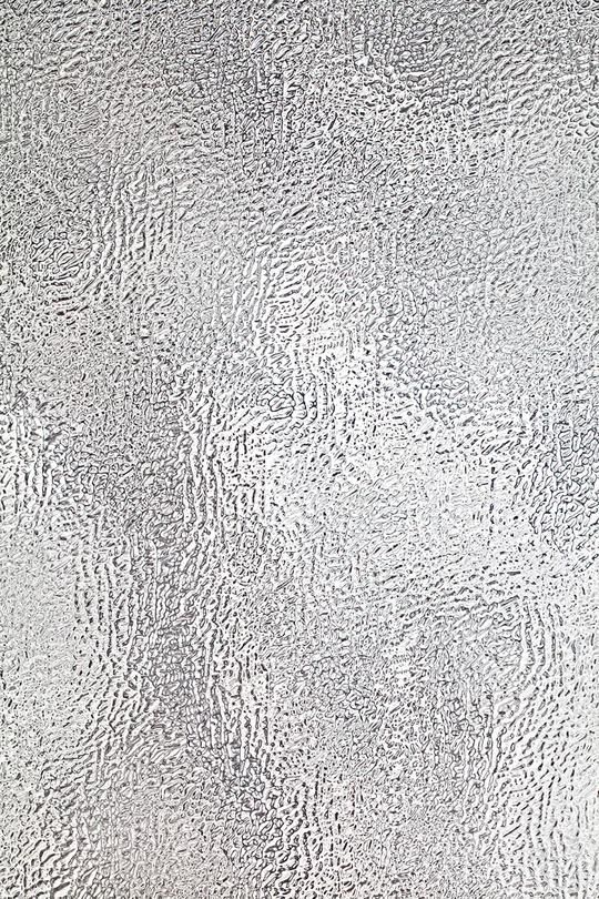 an abstract textured background in white and grey