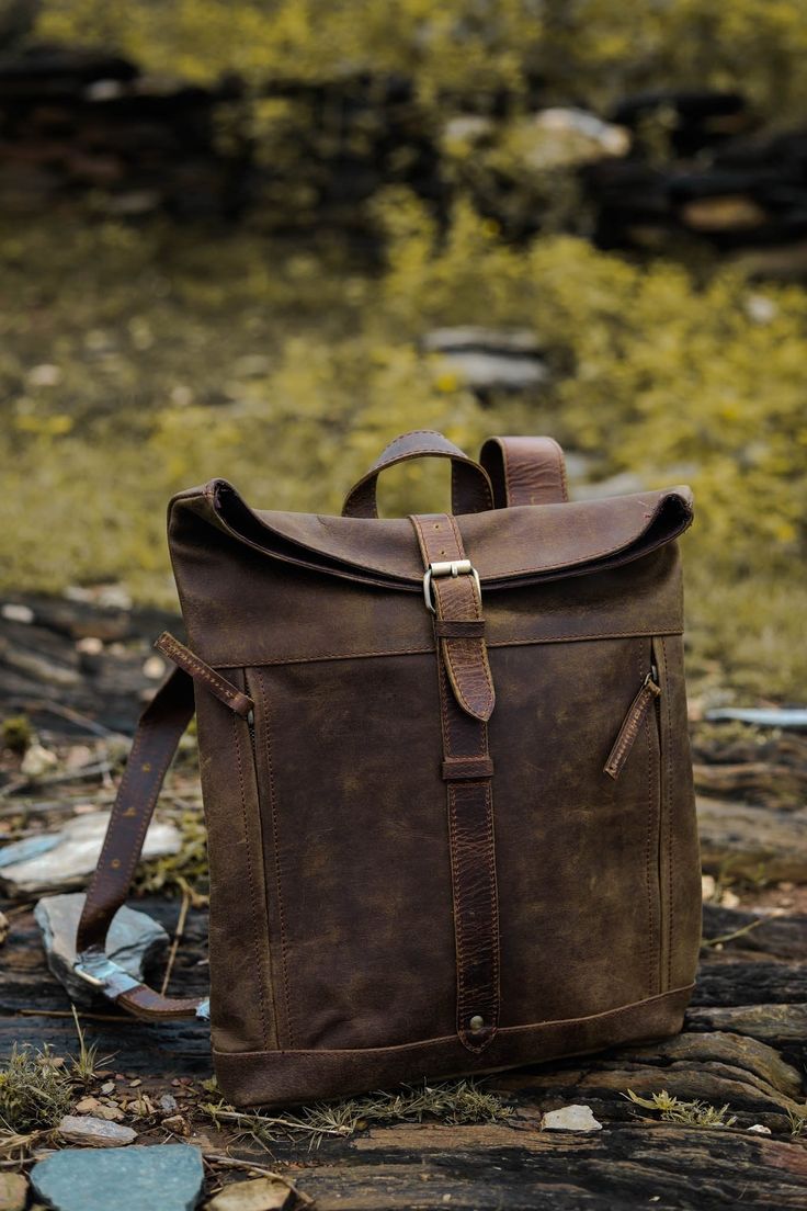 Description Features Shipping Buying modern is the new old fashion now. This men’s rustic leather backpack is the ultimate solution for staying up to date in today’s trends and being chicer. This rustic leather backpack is crafted by full-grain genuine leather. This backpack looks lustrous the way it has the right amount of rustic look on it. The leather used on this backpack is 100% handmade. The color of this leather backpack is brown. The full-grain genuine leather used on this backpack will Leather Backpack With Waxed Finish For Everyday, Leather Backpack With Leather Backing For Outdoor, Leather Satchel Backpack For Outdoor, Everyday Carry Soft Leather Backpack, Soft Leather Everyday Backpack, Everyday Soft Leather Backpack, Rugged Leather Satchel Backpack, Leather Backpack With Waxed Finish For Adventure, Leather Backpack With Leather Patch For Outdoor