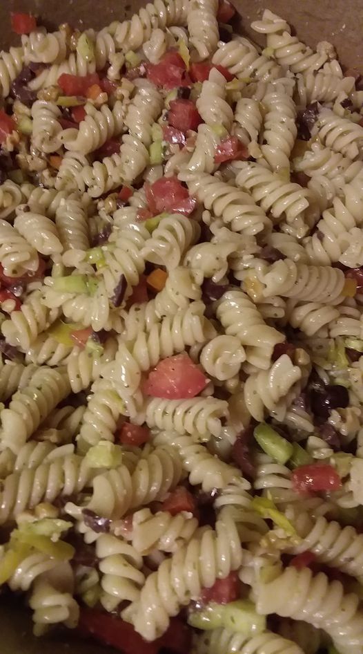 the pasta salad is prepared and ready to be eaten in the oven or on the grill