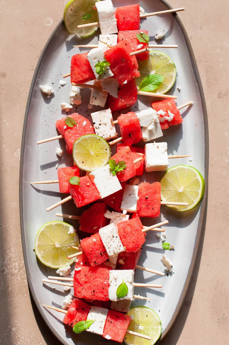 watermelon and lime skewers on a plate