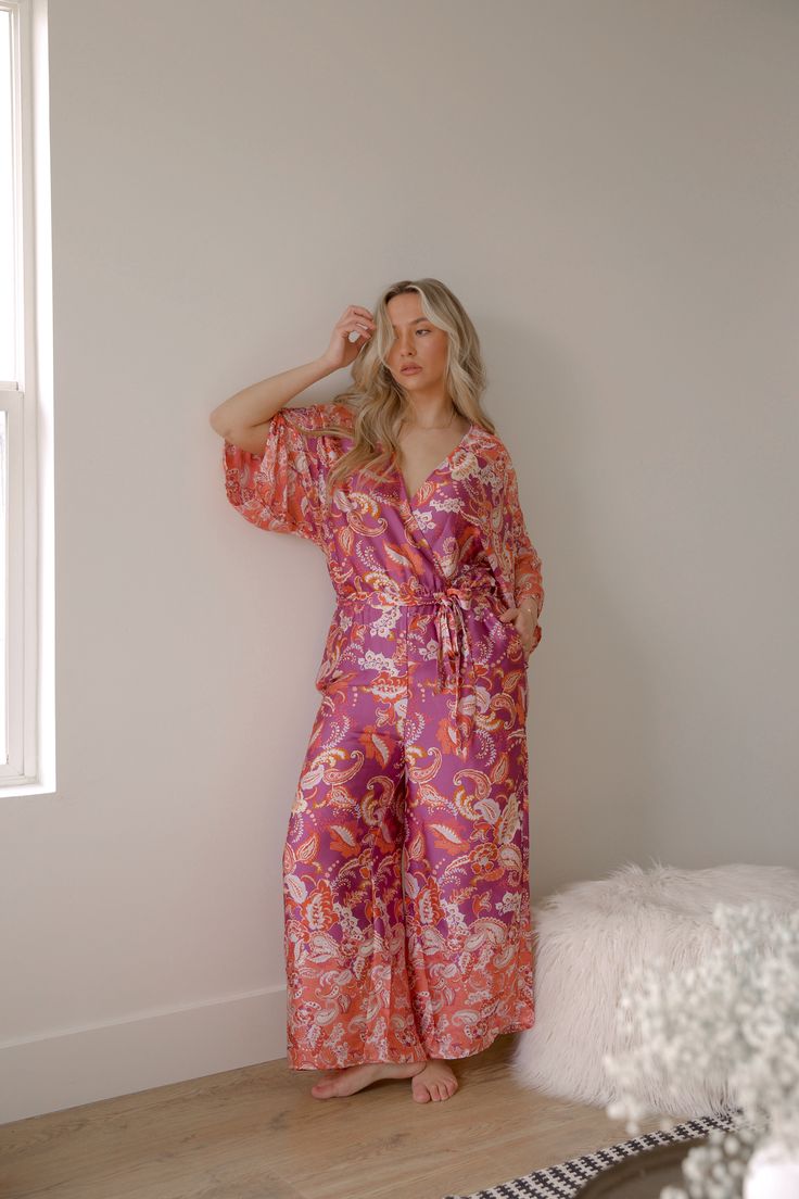 paisley print boho jumpsuit Bohemian Printed V-neck Jumpsuits And Rompers, Bohemian Printed Jumpsuits And Rompers For Spring, Spring Loungewear Jumpsuits And Rompers, Flowy Fit, Spring Flowy Loungewear Jumpsuits And Rompers, Flowy Spring Loungewear Jumpsuits And Rompers, Printed Long Sleeve Jumpsuit And Romper For Vacation, Printed Long Sleeve Jumpsuits And Rompers For Vacation, Bohemian Long Sleeve Jumpsuits And Rompers For Vacation, Spring Bohemian Maxi Jumpsuits And Rompers