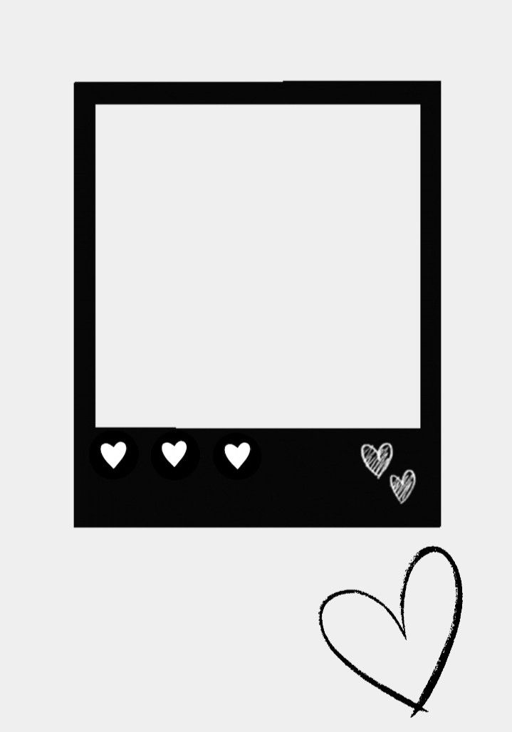 a black and white photo frame with hearts drawn on the side, in front of it