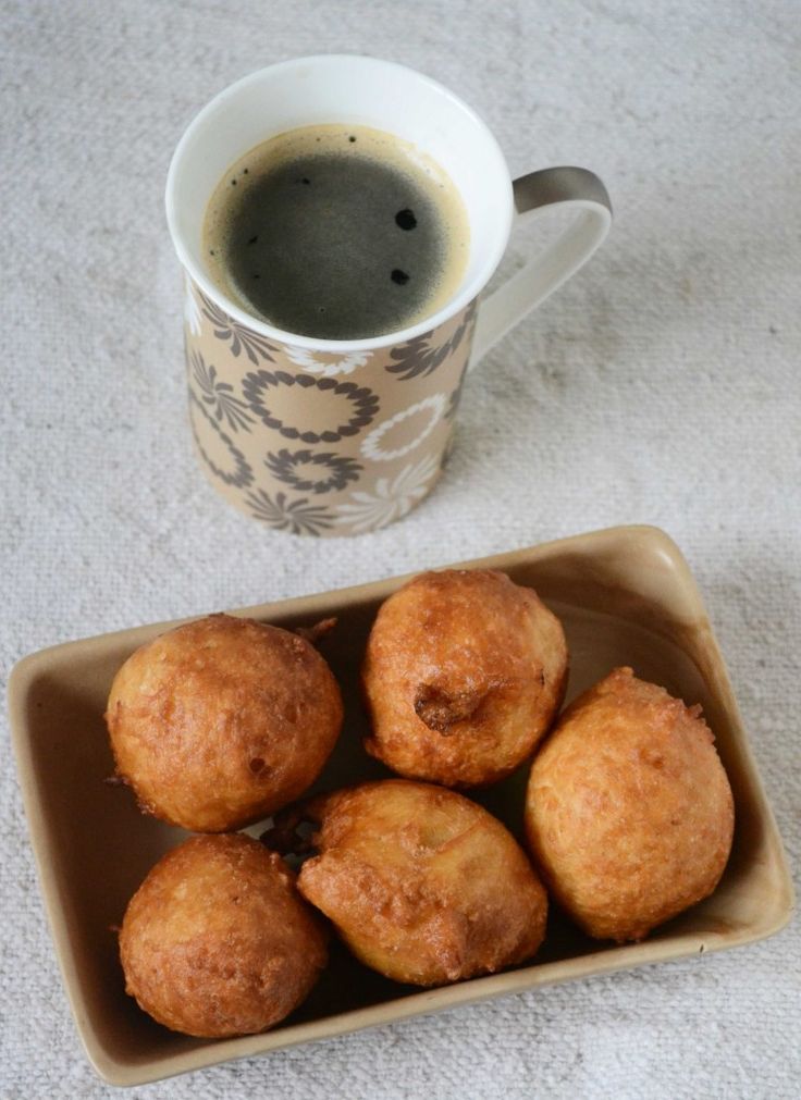 some food and a cup of coffee on a table