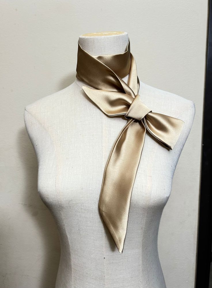 Silk Scarf With Ribbon For Gift, Elegant Ribbon Sashes As Gifts, Elegant Silk Neckwear For Weddings, Elegant Cream Sashes For Formal Occasions, Elegant Cream Satin Bow, Elegant Scarves With Ribbon For Gift, Satin Ties With Decorative Bow For Party, Silk Party Ties, Chic Satin Bow With Ribbon Details