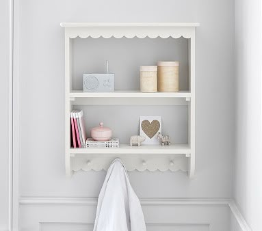 a white shelf that has some items on it