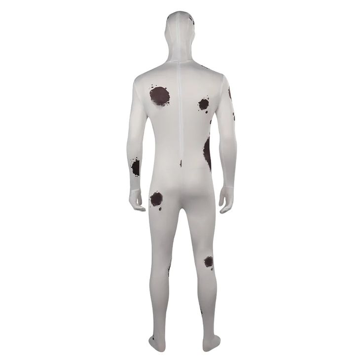 a white mannequin with black spots on it's chest and arms, standing in