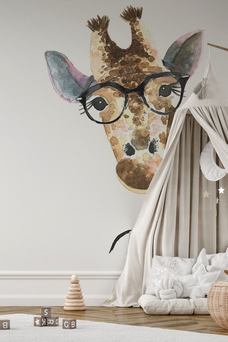 a child's bedroom with a giraffe head on the wall