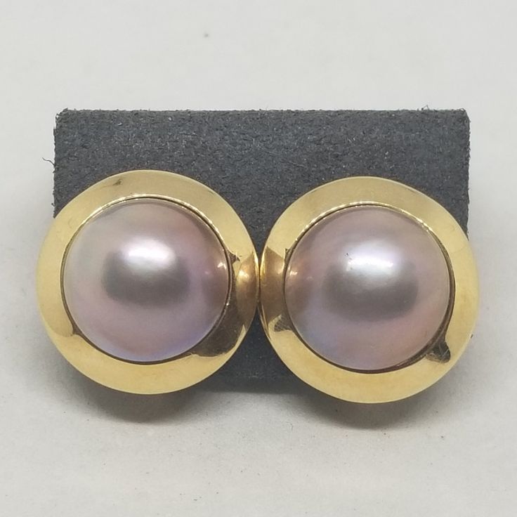 Vintage 14K Yellow Gold with Pearl Screw Back Earrings. Marked 14K on screw back. Stone is 14mm. Weighs 6.7 dwt. We do not check prongs for wear or stones for looseness. All items are sold as is-noting that we are a resale shop so everything here had a previous owner! We will include flaws in the description when noted. This is one of the reasons our items are more affordable than new at a jewelry store. Are these stones real or fake? Aside from diamonds, we do not know if any gemstones are natu Resale Shops, Star Sapphire, Screw Back Earrings, S Star, Pearl Ring, Jewelry Store, Jewelry Stores, Screw, Jewelry Earrings