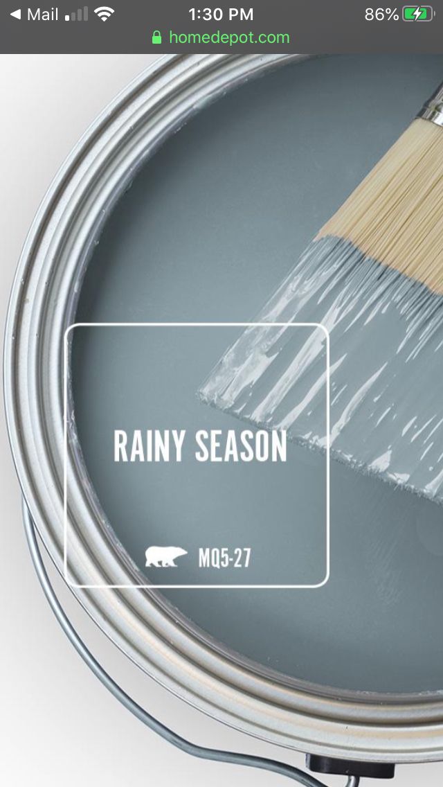 a paint can with a brush on it and the words rain season painted on it