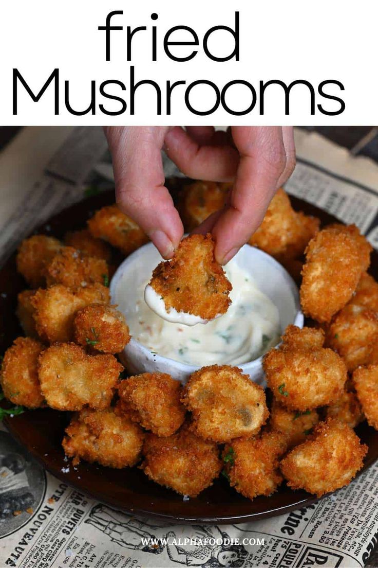 fried mushrooms are served with ranch dip and sour cream sauce on the side for an easy appetizer