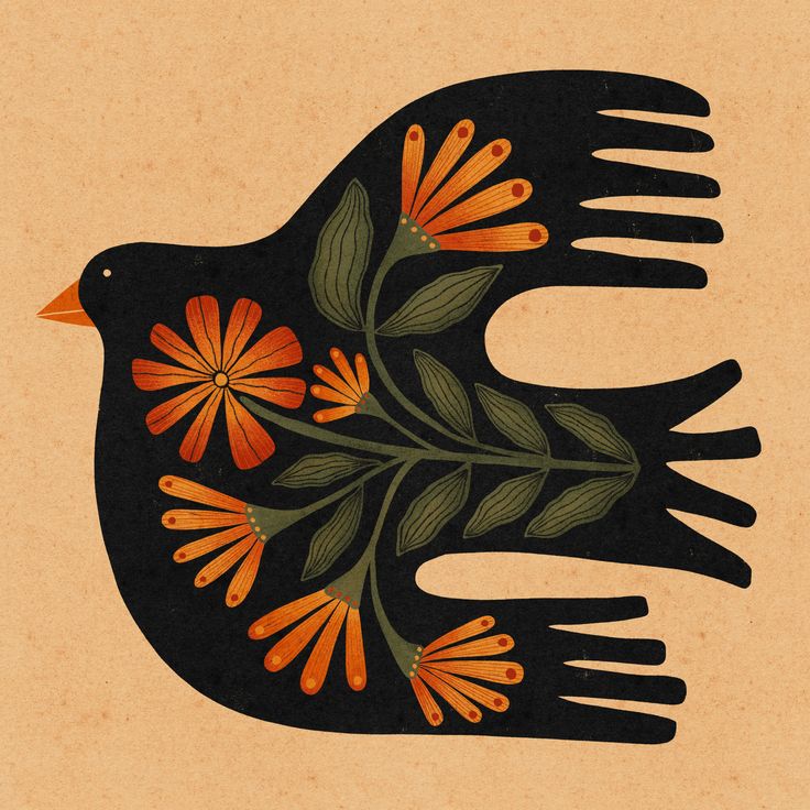 a black bird with orange flowers on it's wings