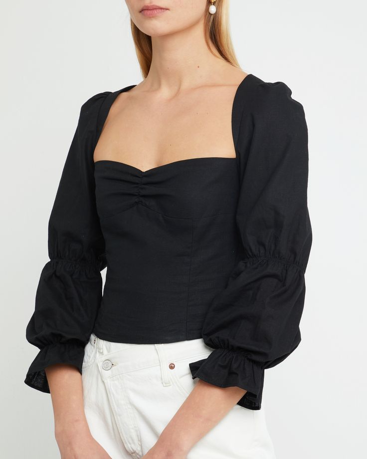 Francesca Top Off-shoulder Top With Smocked Bodice For Fall, Elegant Fitted Tops With Gathered Sleeves, Chic Smocked Top With Puff Sleeves And Gathered Neckline, Chic Fitted Bodice Top With Bust Darts, Fitted Long Sleeve Ruched Blouse, Chic Tops With Fitted Bodice And Bust Darts, Elegant Puff Sleeve Tops For Date Night, Chic Spring Tops With Fitted Bodice, Feminine Smocked Top With Gathered Neckline