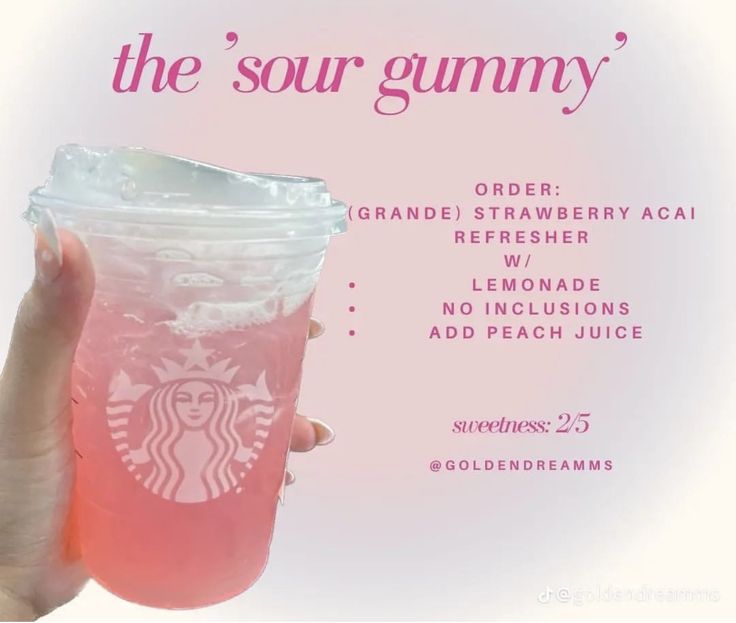 a person holding up a pink drink in front of a white background with the words, the sour gummy '