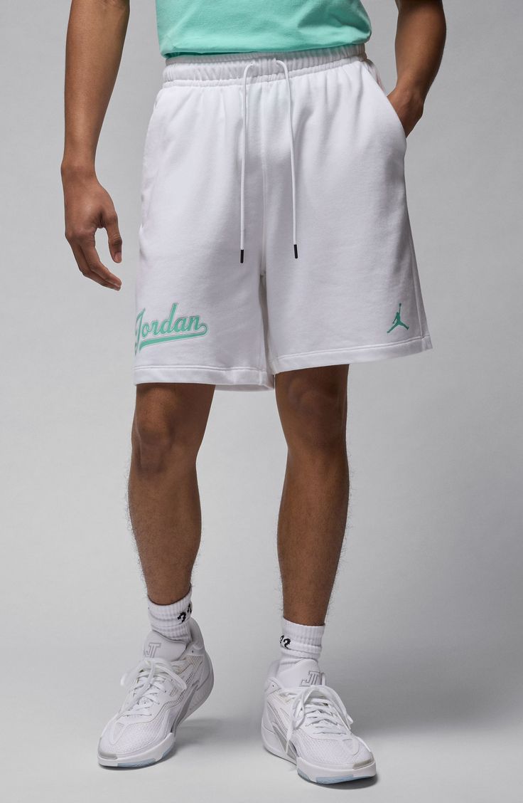 A scripted logo inspired by MJ's baseball career scores points on one leg of sweat shorts made with soft cotton in a relaxed, comfortable fit. 6 1/2" inseam; 23" leg opening; 13 1/2" front rise; 17 1/2" back rise (size Medium) Elastic/drawstring waist Front slant pockets; back patch pocket 80% cotton, 20% polyester Machine wash, tumble dry Imported Sporty White Leisure Shorts, White Cotton Shorts With Letter Print, White Sportswear Shorts For Leisure, White Cotton Athletic Shorts With Moisture-wicking, White Cotton Athletic Shorts With Relaxed Fit, White Moisture-wicking Cotton Athletic Shorts, White Athleisure Shorts With Letter Print, Casual White Athletic Shorts For Leisure, White Relaxed Fit Sports Shorts