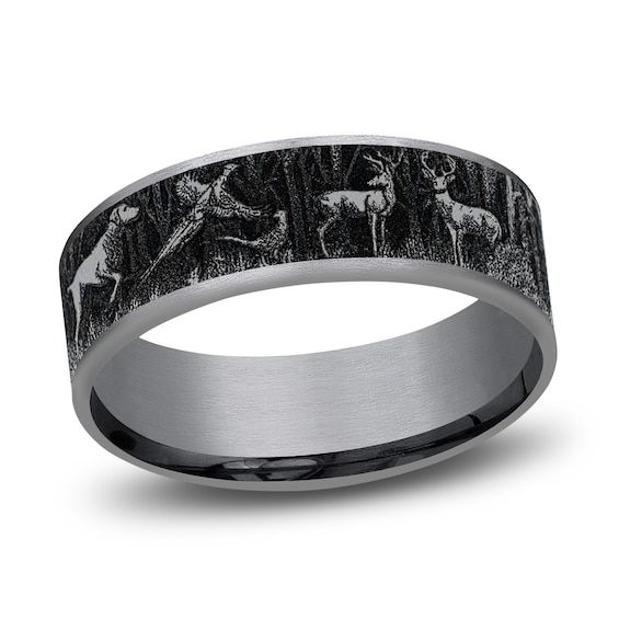 a wedding band with deer in the woods