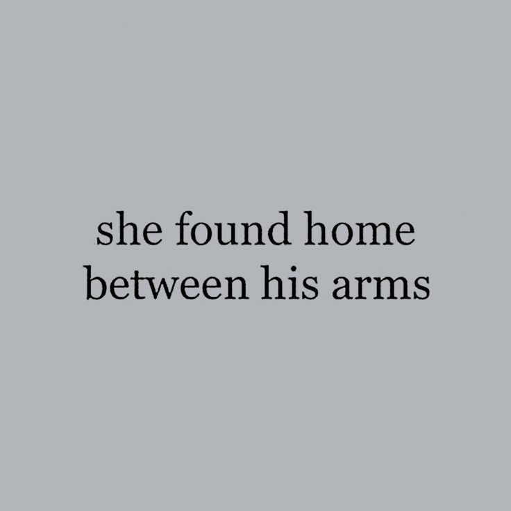 the words she found home between his arms are black and white on a gray background