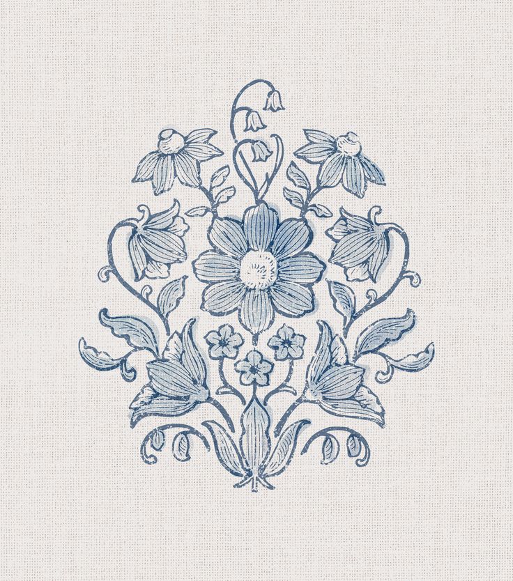 a blue and white embroidered design with flowers