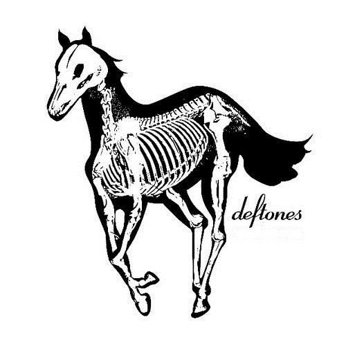 a skeleton horse with the words deftones on it's back and an image of a