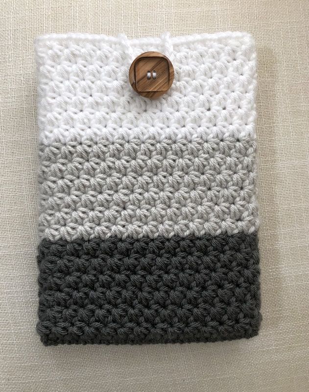 an ipod case with a button on it and the words, star stitch ipad cover