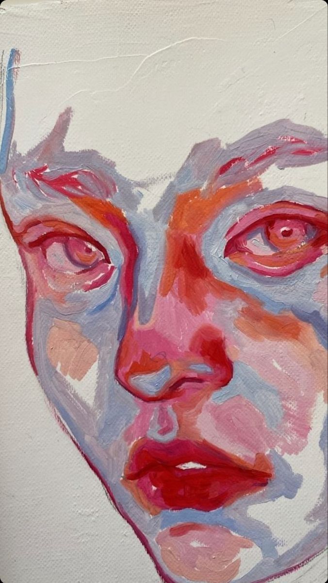 a painting of a woman's face with pink and blue paint on the upper half of her face