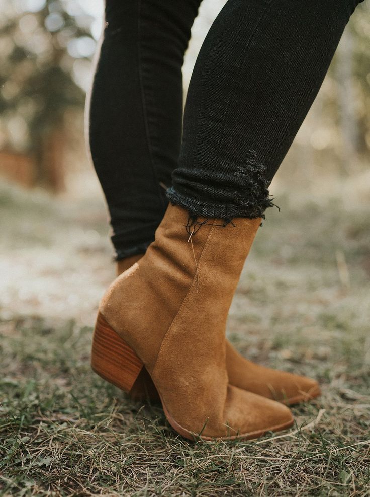 Yep! The Caty Fawn Boot is FINALLY back! Caty Western-inspired ankle boot is a legacy style that has transcended over the seasons. With quality craftsmanship and lux materials, these boots only get better with each wear. Details: Suede upper. Manmade outsole. 7 in / 17.78 cm shaft height. 10 in / 25.4 cm topline circumference. 2.5 in/6.35 cm heel. Textile lining. Padded insole. Zipper closure. Leather stacked heel. Imported. Fits true to size. Trendy Chelsea Boots With Stacked Heel For Fall, Trendy Stacked Heel Boots For Fall, Trendy Fall Moto Boots With Reinforced Heel, Fall Boots With Reinforced Heel And High Ankle, Fall Ankle Moto Boots With Reinforced Heel, Fall Mid-calf Boots With Reinforced Heel And High Ankle, Fall Medium Width Ankle Heeled Boots, Brown Low Heel Chelsea Boots For Fall, Fall Moto Boots With Reinforced Low Heel