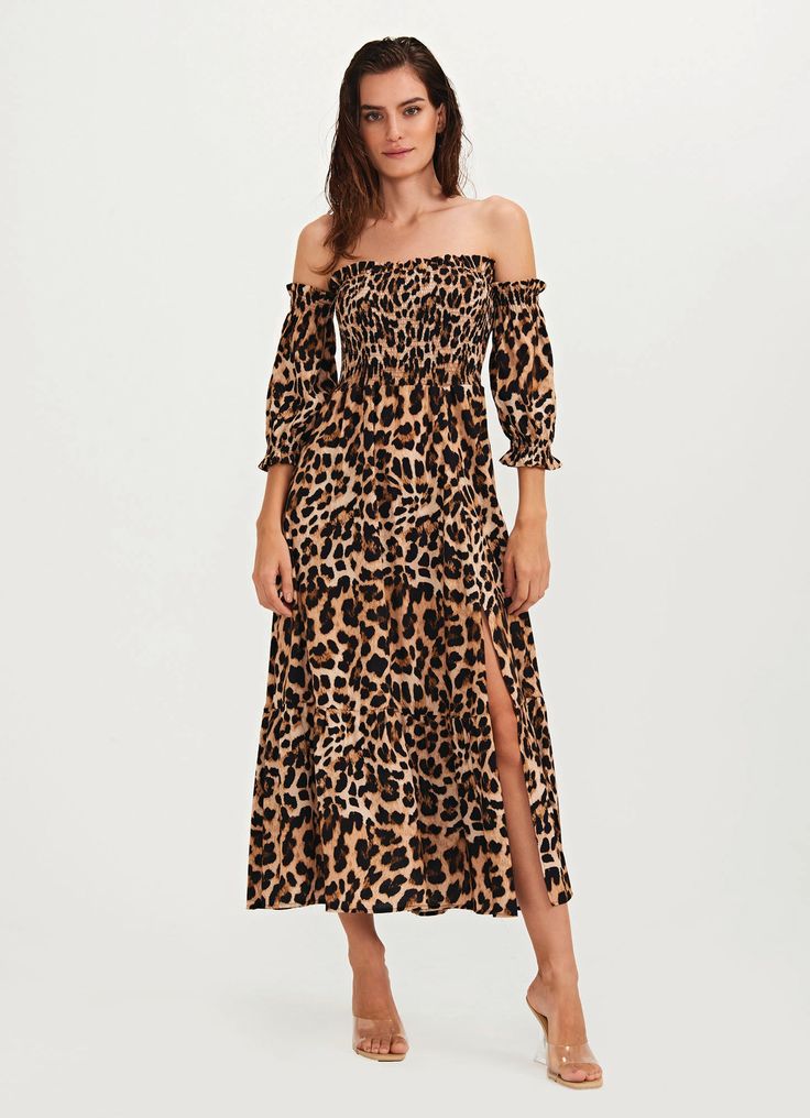 Looking for the perfect beach-to-street outfit? Look no further than our Jaguar Animal Print Dress, the ultimate in versatile style to match with your Brazilian Bikini Featuring a striking animal print design, our dress is perfect for any occasion, from a day at the beach to a night out on the town. The removable sleeves and elastic ruching add a touch of effortless chic to the design, while the lurex threads throughout the fabric add a touch of shimmer and shine. Crafted from high-quality mater Leopard Print Vacation Dresses, Leopard Print Summer Vacation Dresses, Summer Vacation Leopard Print Dresses, Chic Leopard Print Beach Dress, Casual Leopard Print Summer Dress, Leopard Print Maxi Dress For Beach, Spring Leopard Print Maxi Dress For Beach, Leopard Print Midi Dress For Brunch, Casual Leopard Print Midi Dress For Summer