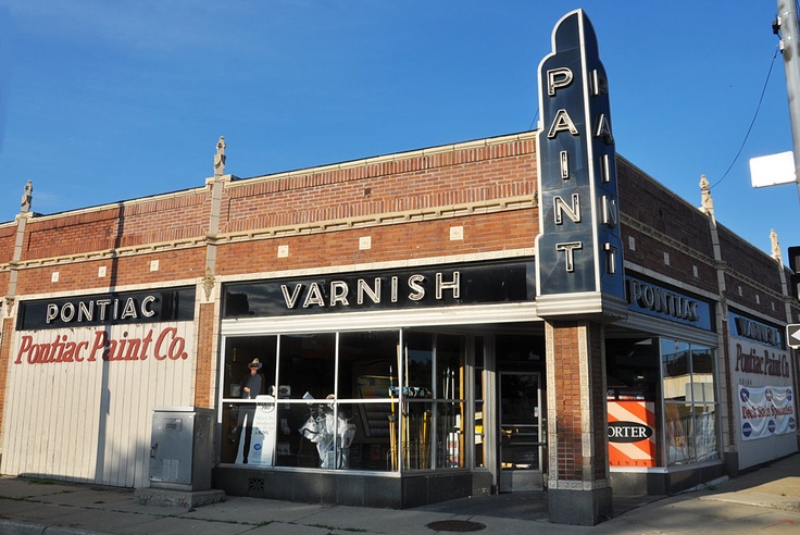 an old fashion store on the corner of a street