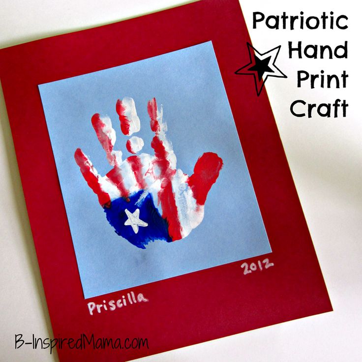 a patriotic handprint craft made with red, white and blue paper