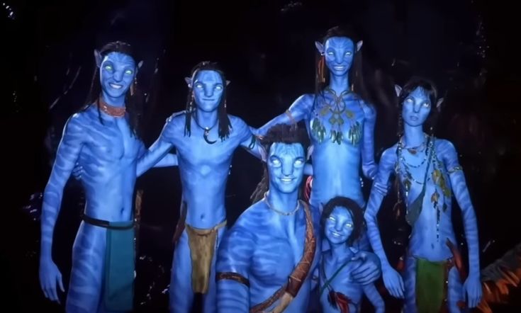 an image of some people with blue paint on their bodies