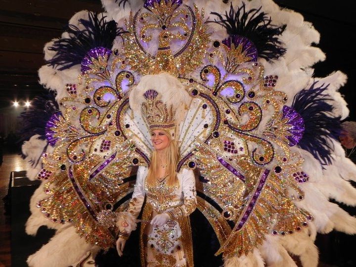 a woman dressed in elaborately decorated costume