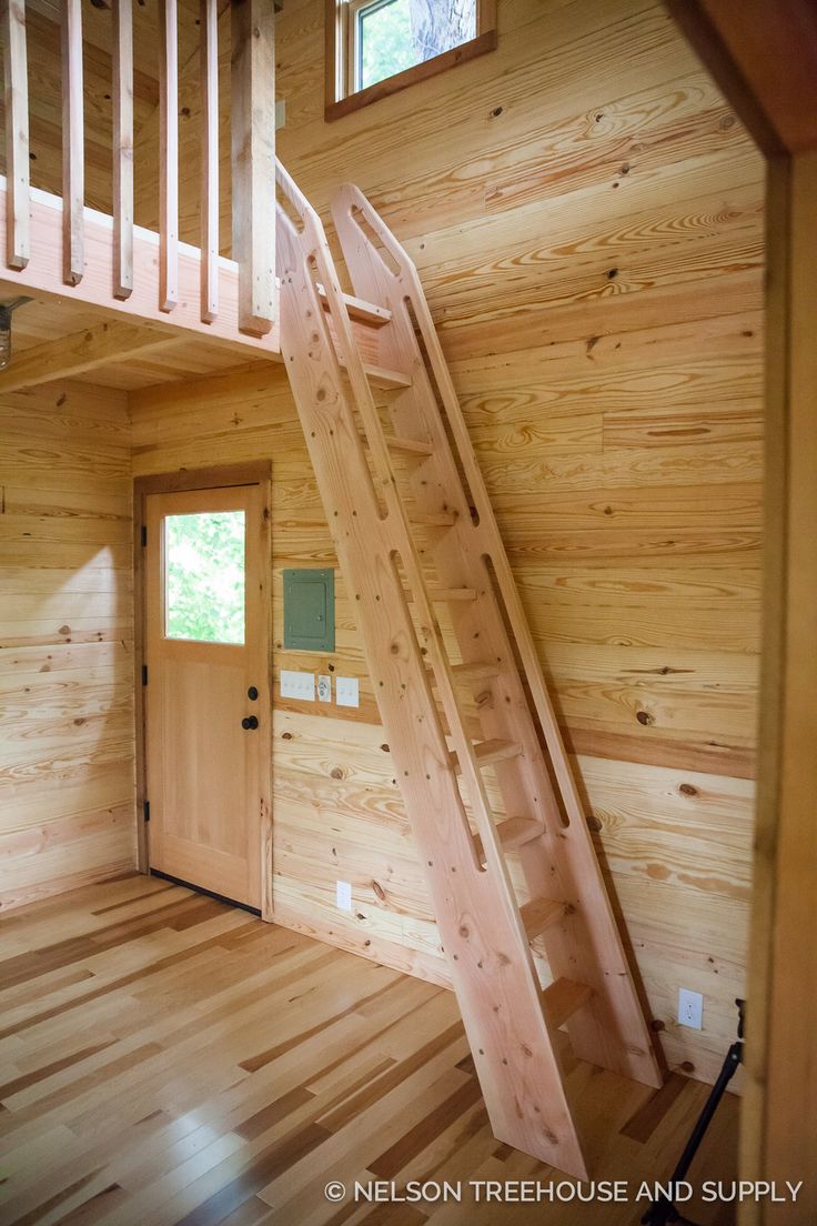 the stairs are made out of wood and have been built into the wall