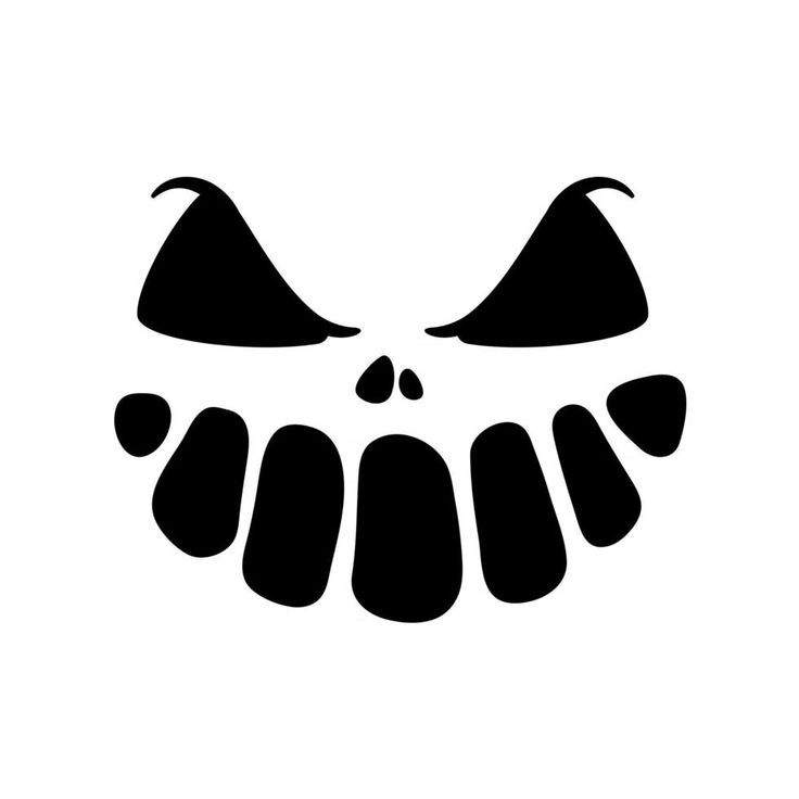 a black and white image of an evil face