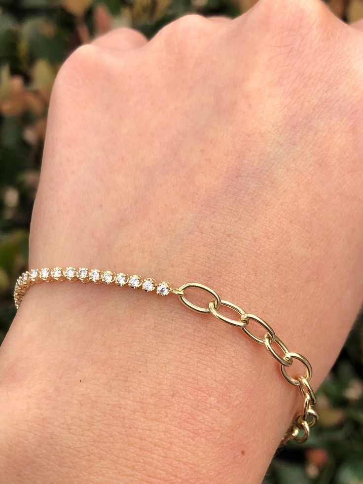 MaterialGold, Diamond DescriptionUp for sale is a beautiful 14K Gold Half Chain Half Round Tennis Diamond Bracelet. Specifications:-Model #: DHODHFTENNSHFCHN-Metal Type: Rose, White, or Yellow Gold-Metal Purity: 14K-Gold Weight: 3.2 grams approx.-Total Diamond Weight: 0.50-0.55 carats approx. -Length: Adjustable 6" or 7" -Color: F-G-Clarity: SI Brief Overview:-Free Sizing W/ Purchase-14 Day Return Policy-Conflict Free Diamonds-Satisfaction Guarantee-Black Velvet Box Included W/ Purchase.Satisfac Yellow Gold Tennis Bracelet With Adjustable Chain, Yellow Gold Cubic Zirconia Tennis Bracelet With Adjustable Chain, Diamond Chain Bracelet With Adjustable Chain, Luxury 14k Gold Diamond Bracelet With Adjustable Chain, Classic Diamond Bracelet With Chain, Elegant Round Diamond Bracelet With Solid Link Construction, Elegant Round Diamond Bracelet With Solid Link, Elegant Diamond Bracelet With Adjustable Chain, Luxury Diamond Tennis Bracelet With Adjustable Chain