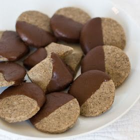 a white plate topped with chocolate covered cookies