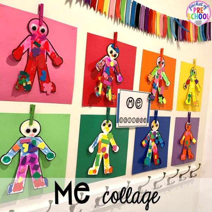 there are many colorful paper dolls hanging on the wall