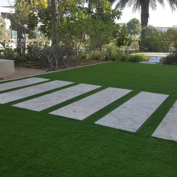 artificial grass is laid out on the lawn