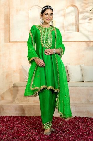 Green short anarkali with floral pattern gota embroidery. Comes with matching salwar and dupatta. - Aza Fashions Slub Silk Traditional Wear With Dupatta For Eid, Eid Slub Silk Traditional Wear With Dupatta, Designer Slub Silk Sharara With Dabka, Pista Green Slub Silk Anarkali Set With Dabka Work, Fitted Slub Silk Salwar Kameez With Cutdana, Bollywood Style Unstitched Slub Silk Suit With Gota Work, Bollywood Style Slub Silk Churidar With Dabka, Anarkali Salwar Kameez With Kundan For Eid, Anarkali Style Pista Green Traditional Wear For Diwali