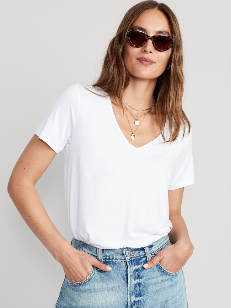 rib-knit v-neck short sleeves relaxed fit hits below waist models are approx.  5'9" and wear sizes s (4), l (12) and xl (18)Machine wash cold, tumble dry low.  spandex 5% rayon 95% White V-neck T-shirt For Everyday, Cheap Versatile V-neck T-shirt, White Fitted V-neck T-shirt, White Relaxed Fit V-neck Short Sleeve Top, White Stretch V-neck Shirt, Jeans And Bodysuit, Knitted Tshirt, V Neck Tee, Western Outfits