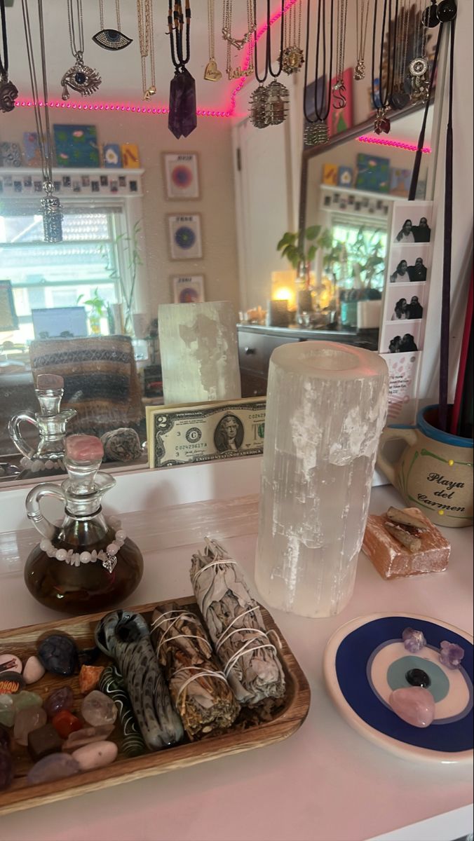 there are many items on the counter in this room, including jewelry and necklaces