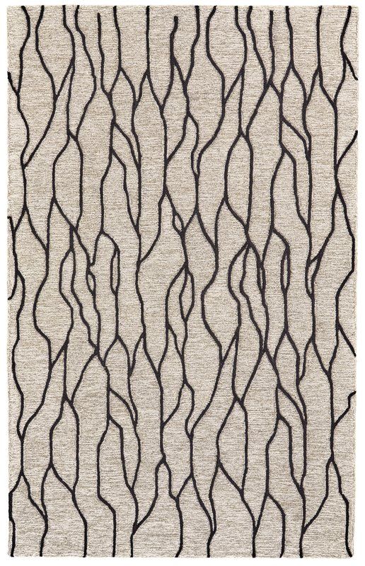 an area rug with black and white lines on it